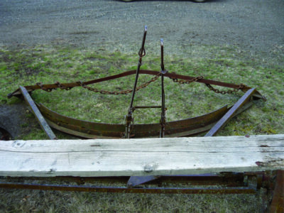 Looking for leads on early horse-drawn grader? Image